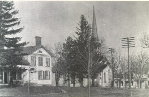 Col. Elias J. Pettibone came to Pine Hill in 1825 and erected this house under the pines that gave the village its picturesque name.